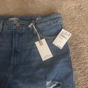 Good American Good Curve Skinny Crop Jeans